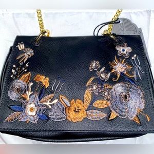 Faux leather embroidered Crossbody bag